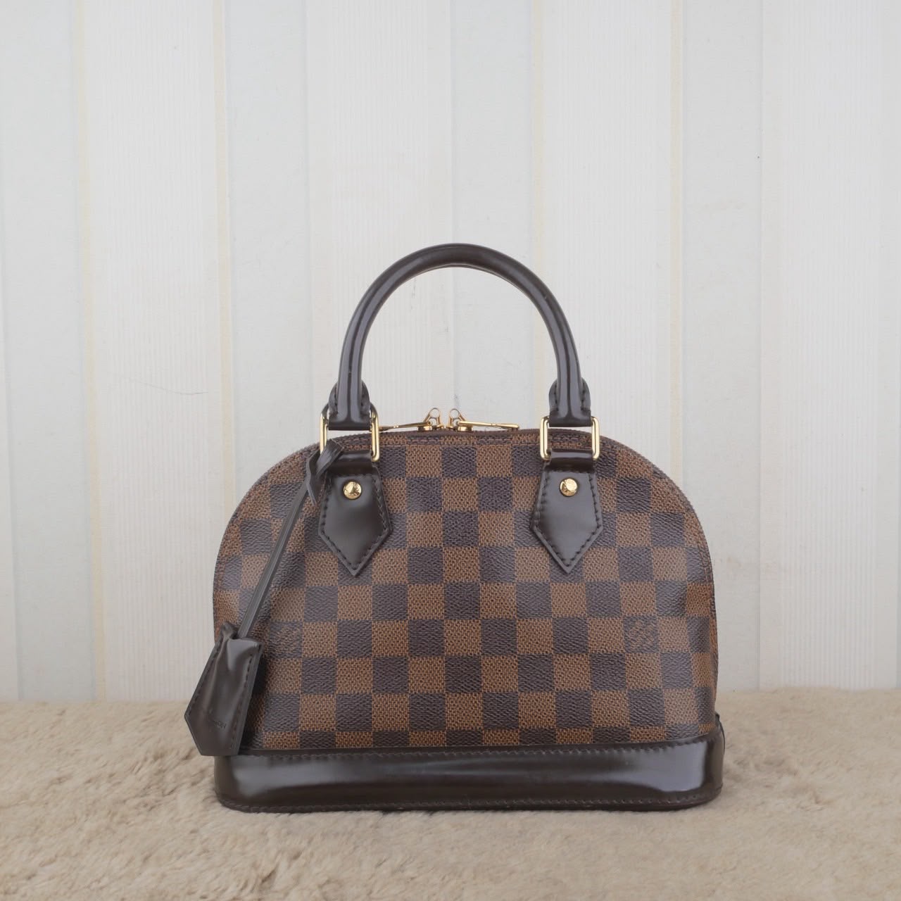 Bolso Louis Vuitton Alma BB Damier Ebene
