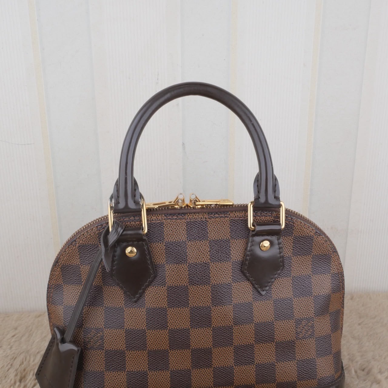 Bolso Louis Vuitton Alma BB Damier Ebene