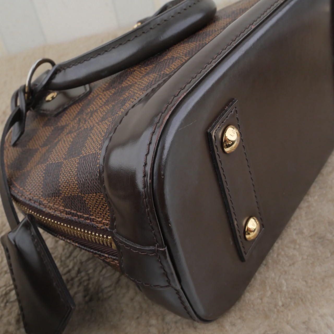 Bolso Louis Vuitton Alma BB Damier Ebene