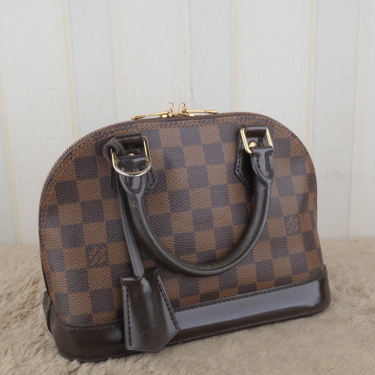 Bolso Louis Vuitton Alma BB Damier Ebene