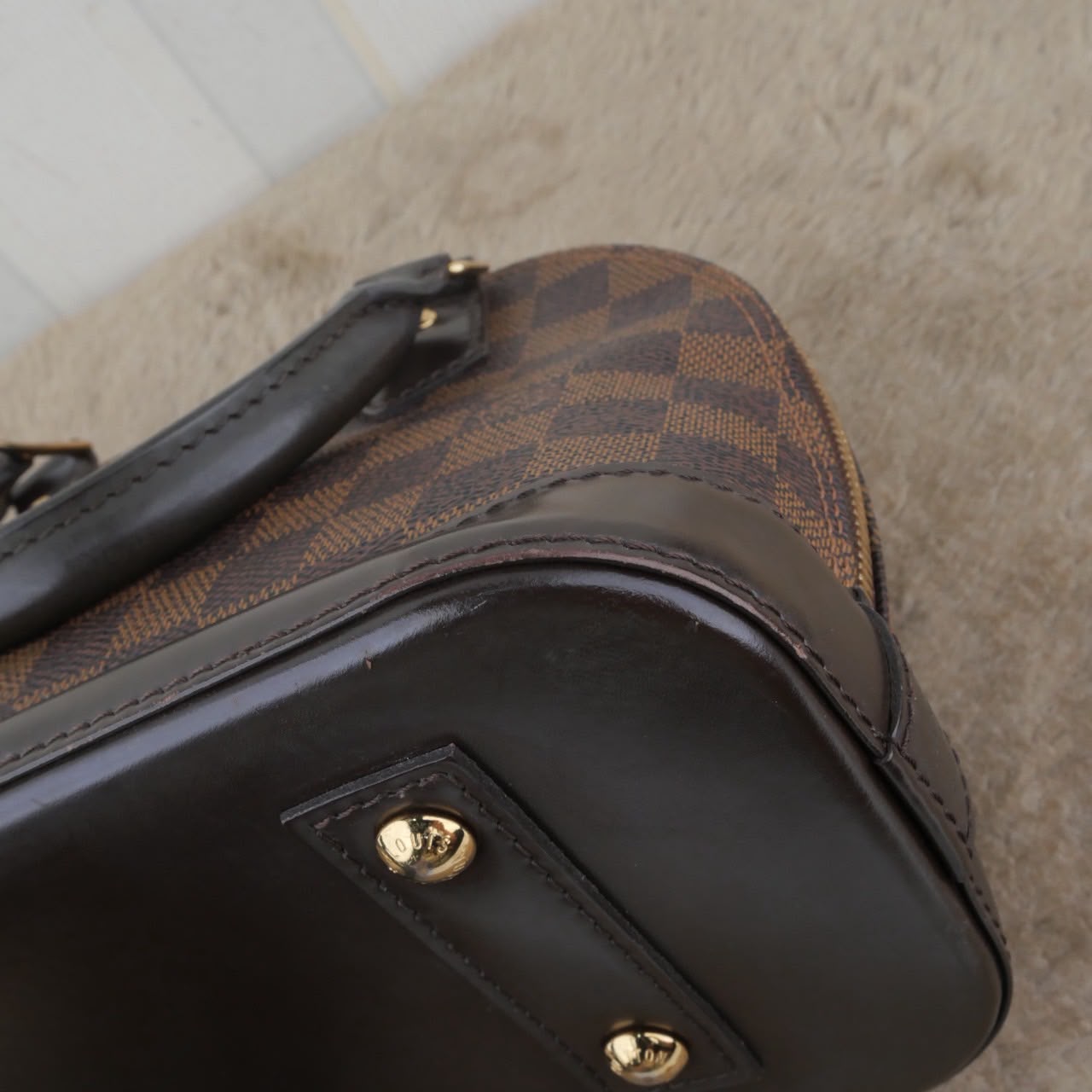 Bolso Louis Vuitton Alma BB Damier Ebene